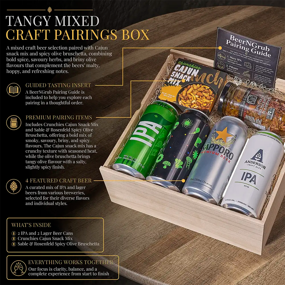 A wooden gift box labeled 'TANGY MIXED CRAFT PAIRINGS BOX' filled with assorted craft beer cans, snack bags, and a guided tasting insert, shown on a dark background with descriptive marketing text.